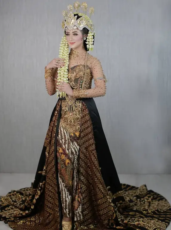 Model kebaya pengantin Jawa yang dipadukan dengan hijab