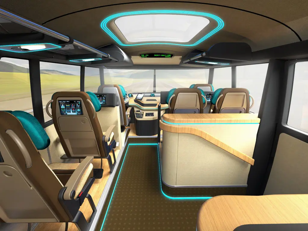 Interior bus futuristik dengan layar interaktif besar