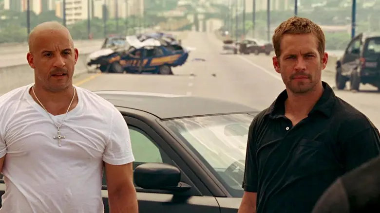 Vin Diesel dan Paul Walker dalam film Fast and Furious